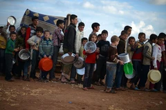 Khoảng 500.000 người Syria không nhận được cứu trợ lương thực do chiến tranh và lệnh cấm. (Nguồn: theguardian.com)
