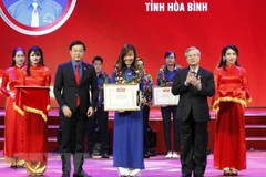 Cán bộ đoàn xuất sắc được nhận giải Lý Tự Trọng. (Ảnh: TTXVN)