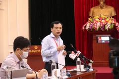 Ông Mai Văn Trinh thông tin với báo chí về kỳ thi. (Ảnh: PV/Vietnam+)