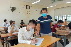Thí sinh dự thi tốt nghiệp trung học phổ thông năm 2020. (Ảnh: Phạm Mai/Vietnam+)