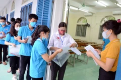 Thí sinh dự thi tốt nghiệp trung học phổ thông. (Ảnh: TTXVN)