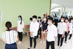 Thí sinh dự thi tốt nghiệp trung học phổ thông. (Ảnh: PV/Vietnam+)