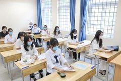 Thí sinh dự thi tốt nghiệp trung học phổ thông. (Ảnh: TTXVN)