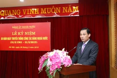 Ông Lê Hoài Trung, Ủy viên Trung ương Đảng, Bí thư Đảng ủy Ngoài nước, Thứ trưởng Bộ Ngoại giao đọc diễn văn kỷ niệm 58 năm Ngày truyền thống công tác đảng ngoài nước. (Ảnh: Phương Hoa/TTXVN)