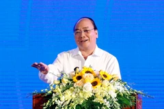Thủ tướng Nguyễn Xuân Phúc với các đại biểu dự hội nghị. (Ảnh: Thống Nhất/TTXVN)