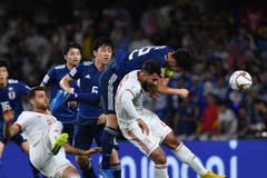 Một pha tranh bóng của cầu thủ hai đội. (Nguồn: the-afc.com/asiancup)