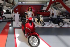 Gian triển lãm xe máy điện Vinfast của Việt Nam tại Triển lãm phương tiện giao thông, vận tải và công nghiệp phụ trợ 2019. (Ảnh: Trần Việt/TTXVN)