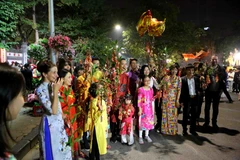 Người dân Thủ đô đi chơi Tết. (Ảnh: Thành Đạt/TTXVN)