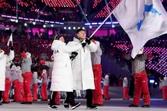 Đoàn vận động viên chung hai miền Triều Tiên diễu hành trong lễ khai mạc Olympic mùa Đông. (Nguồn: Getty Images)