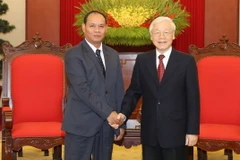 Tổng Bí thư, Chủ tịch nước Nguyễn Phú Trọng tiếp Bộ trưởng Bộ An ninh Lào Vilay Lakhamphong. (Ảnh: Trí Dũng/TTXVN)