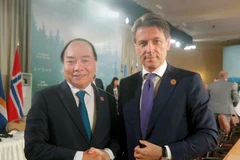 Thủ tướng Nguyễn Xuân Phúc gặp Thủ tướng Italy Giuseppe Conte Hội nghị Thượng đỉnh Nhóm các nước công nghiệp phát triển hàng đầu thế giới (G7) mở rộng, Canada, tháng 6/2018. (Nguồn: TTXVN)