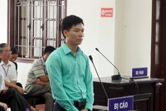 Bị cáo Hoàng Công Lương tại tòa. (Ảnh: Thanh Hải/TTXVN)