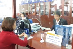 Hà Nội triển khai dịch vụ nhận, trả kết quả thủ tục hành chính tại nhà