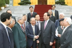 Chủ tịch nước Trần Đại Quang với các đại biểu. (Ảnh: Nhan Sáng/TTXVN)