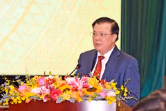 Bộ trưởng Bộ Tài chính Đinh Tiến Dũng phát biểu tại hội nghị, ngày 8/1. (Ảnh: Vietnam+)