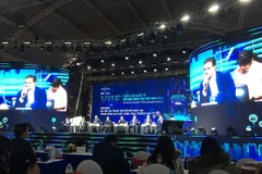 Tọa đàm “Vai trò Trung tâm Đổi mới sáng tạo trong nâng cao chất lượng tăng trưởng kinh tế.” (Ảnh: Vietnam+)