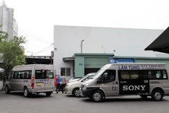 Xe xếp hàng chờ vào kiểm định tại Trung tâm đăng kiểm xe cơ giới 50-05V, quận Tân Bình, Thành phố Hồ Chí Minh. (Ảnh: Tiến Lực/TXVN)