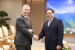 Thủ tướng Phạm Minh Chính tiếp Đại sứ Bỉ tại Việt Nam Karl Hendrik Margareta Van Den Bossche. (Ảnh: Dương Giang/TTXVN)