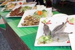Các món ngon đặc sản Việt được trình bày công phu tại Lễ hội văn hóa ẩm thực, món ngon Saigontourist Group 2023. (Ảnh: Mỹ Phương/TTXVN)