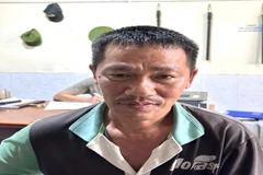 Đối tượng Nguyễn Ngọc Đức, từ đầu năm đến nay đã cho hơn 100 người, chủ yếu là công nhân làm việc tại các Khu công nghiệp trên địa bàn huyện Nhơn Trạch vay với tổng số tiền hơn 400 triệu đồng với lãi suất 121%/năm, thu lợi bất chính hơn 90 đồng. (Ảnh: TTX