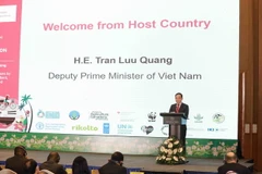 Phó Thủ tướng Chính phủ Trần Lưu Quang phát biểu khai mạc. (Ảnh: Vũ Sinh/TTXVN)