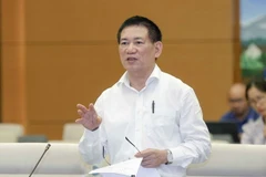 Bộ trưởng Bộ Tài chính Hồ Đức Phớc phát biểu. (Ảnh: Doãn Tấn/TTXVN)