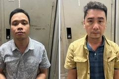 Đối tượng Bùi Minh Ngọc (trái), Nguyễn Trung Sáng. (Ảnh: TTXVN phát)