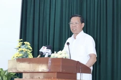 Chủ tịch UBND Thành phố Hồ Chí Minh Phan Văn Mãi phát biểu khai mạc Hội thảo. (Ảnh: Xuân Anh/TTXVN)