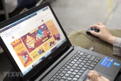 Phiên Chợ tết hàng Việt Nam chất lượng cao là phiên chợ online đầu tiên của Sàn thương mại điện tử hàng Việt Nam chất lượng cao. (Ảnh: Mỹ Phương/TTXVN)