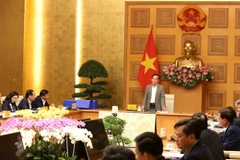 Phó Thủ tướng Trần Lưu Quang phát biểu chỉ đạo tại cuộc họp của Hội đồng. (Ảnh: An Đăng/TTXVN)