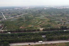 Tuyến vành đai 4 qua đại lộ Thăng Long trên địa bàn xã Song Phương. (Ảnh: Huy Hùng/TTXVN)