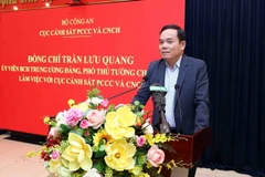 Phó Thủ tướng Trần Lưu Quang phát biểu. (Ảnh: Phạm Kiên/TTXVN)