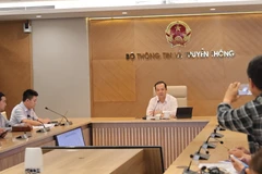 Thứ trưởng Phạm Đức Long cho biết, thời gian vừa qua số lượng cuộc gọi lừa đảo, đe dọa tăng mạnh. (Ảnh: Minh Sơn/Vietnam+)