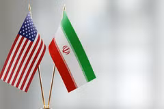 Cờ Mỹ và Iran. (Nguồn: AFP)