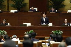 Bộ trưởng Bộ Thông tin và Truyền thông Nguyễn Mạnh Hùng giải trình, làm rõ một số vấn đề đại biểu Quốc hội nêu. (Ảnh: An Đăng/TTXVN)