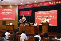 Chủ tịch nước Nguyễn Xuân Phúc phát biểu tại buổi tiếp xúc cử trị quận 10. (Ảnh: Thống Nhất/TTXVN)