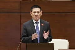 Bộ trưởng Bộ Tài chính Hồ Đức Phớc phát biểu giải trình, làm rõ một số vấn đề đại biểu Quốc hội nêu. (Ảnh: Doãn Tấn/TTXVN)