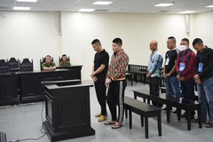 Các bị cáo tại phiên tòa. (Nguồn: hanoimoi.com.vn)