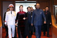Chủ tịch Quốc hội Nguyễn Thị Kim Ngân đón Tổng thống Ấn Độ Ram Nath Kovin. (Ảnh: Trọng Đức/TTXVN)
