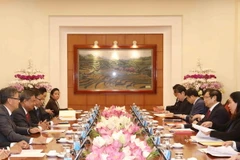 Trưởng Ban Tổ chức Trung ương Phạm Minh Chính hội đàm với Trưởng Ban Tổ chức Trung ương Đảng Nhân dân Cách Mạng Lào. (Ảnh: Phương Hoa/TTXVN)