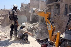 Cảnh đổ nát sau các vụ không kích ở Jallum, khu vực lân cận thành phố Aleppo ngày 20/8. (Nguồn: AFP/ TTXVN)