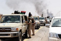 Binh sỹ thuộc lực lượng ủng hộ Chính phủ đoàn kết Libya làm nhiệm vụ tại thành phố Sirte ngày 10/6. (Nguồn: AFP/TTXVN)