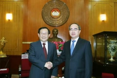 Chủ tịch Ủy ban Trung ương Mặt trận Tổ quốc Việt Nam Nguyễn Thiện Nhân và Phó Chủ tịch Chính hiệp toàn quốc Trung Quốc Vạn Cương. (Ảnh: Nguyễn Dân/TTXVN)
