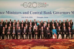 Các Bộ trưởng Tài chính và thống đốc ngân hàng G20 chụp ảnh chung tại hội nghị ngày 24/7. (Nguồn: EPA/TTXVN)
