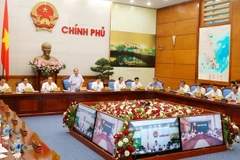 Thủ tướng Nguyễn Xuân Phúc chủ trì hội nghị trực tuyến toàn quốc của Chính phủ về công tác bảo vệ môi trường. (Ảnh: Thống Nhất/TTXVN)