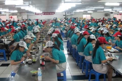 Một doanh nghiệp tại khu chế xuất Tân Thuận xây dựng bếp ăn tập thể ngay tại công ty. (Ảnh: Phương Vy/TTXVN)