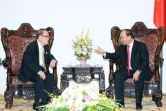Thủ tướng Nguyễn Xuân Phúc tiếp Cựu Chủ tịch Thượng viện Malaysia Tan Sri Dato Michael Chen Wing Sum. (Ảnh: Thống Nhất/TTXVN)