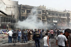 Hiện trường một vụ đánh bom đẫm máu ở thủ đô Baghdad. (Nguồn: AFP/TTXVN) 