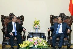 Thủ tướng Nguyễn Xuân Phúc tiếp ông Jonathan Choi, Chủ tịch Tập đoàn Sunwah, Hong Kong. (Ảnh: Thống Nhất/TTXVN)