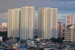 Nới lỏng điều kiện giúp thúc đẩy người dân dễ dàng tiếp cận nhà ở xã hội. (Ảnh: Vietnam+)